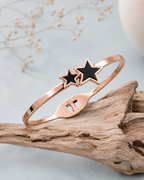 Twin star rose gold bracelet with black accents