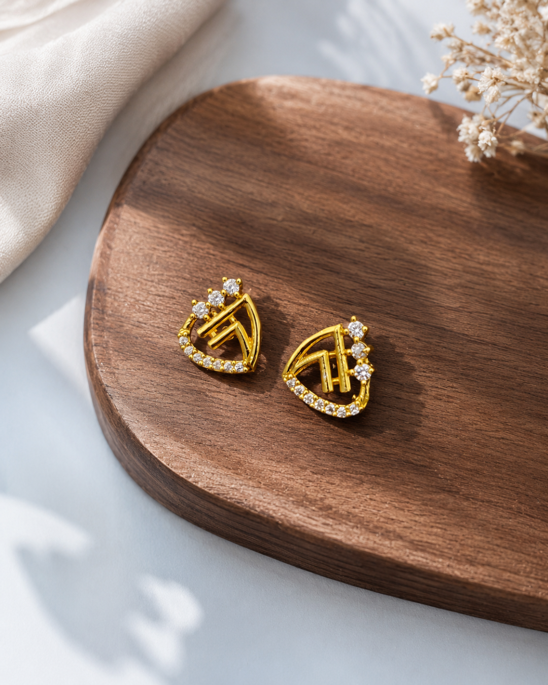 Golden CZ heart stud earrings for women