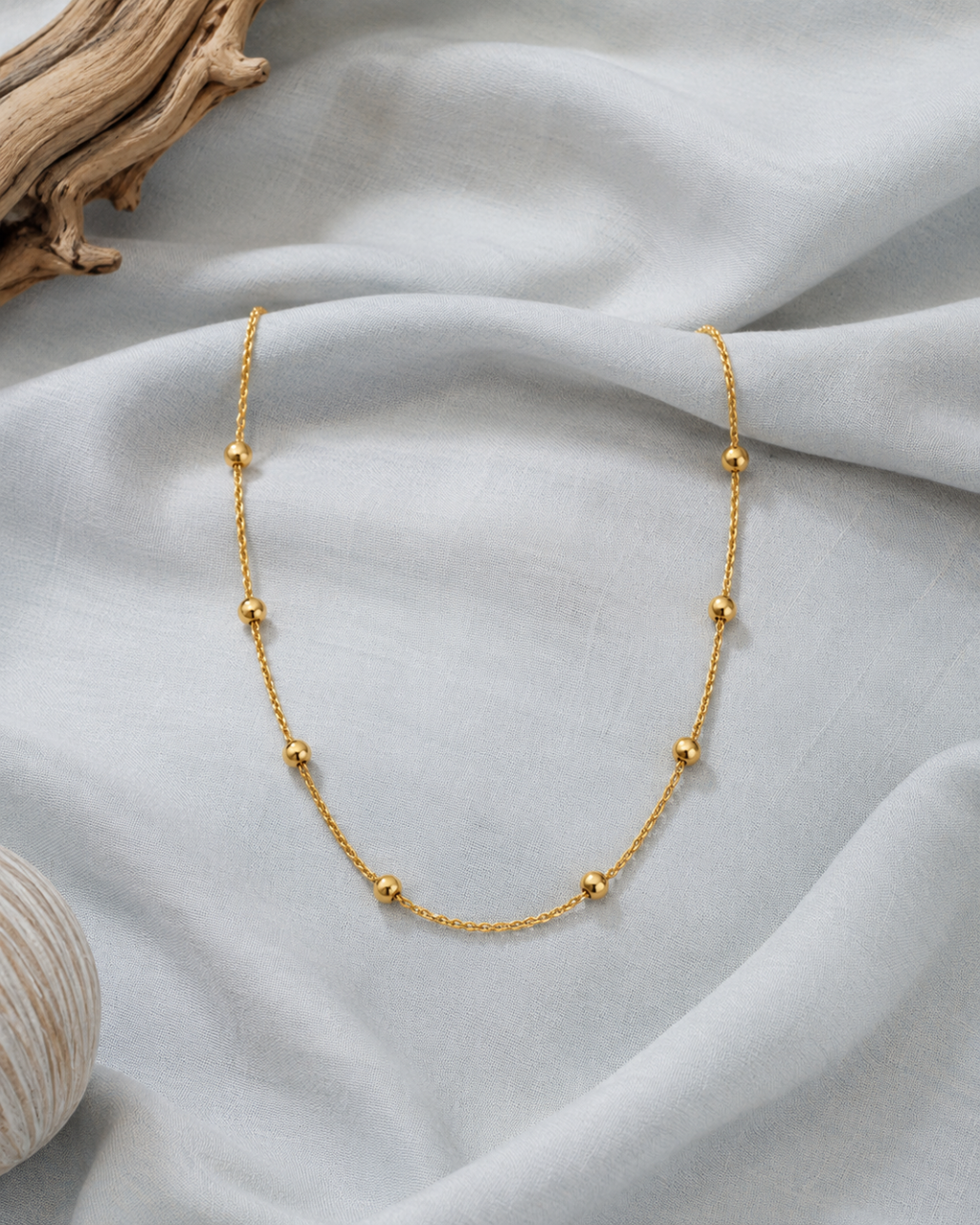 Golden beaded chain necklace