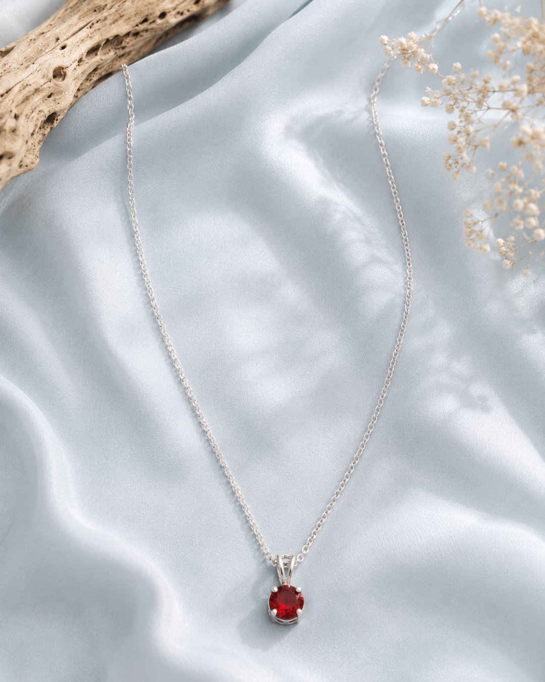 Ruby solitaire pendant necklace