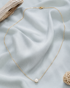 Elegant pearl solitaire necklace