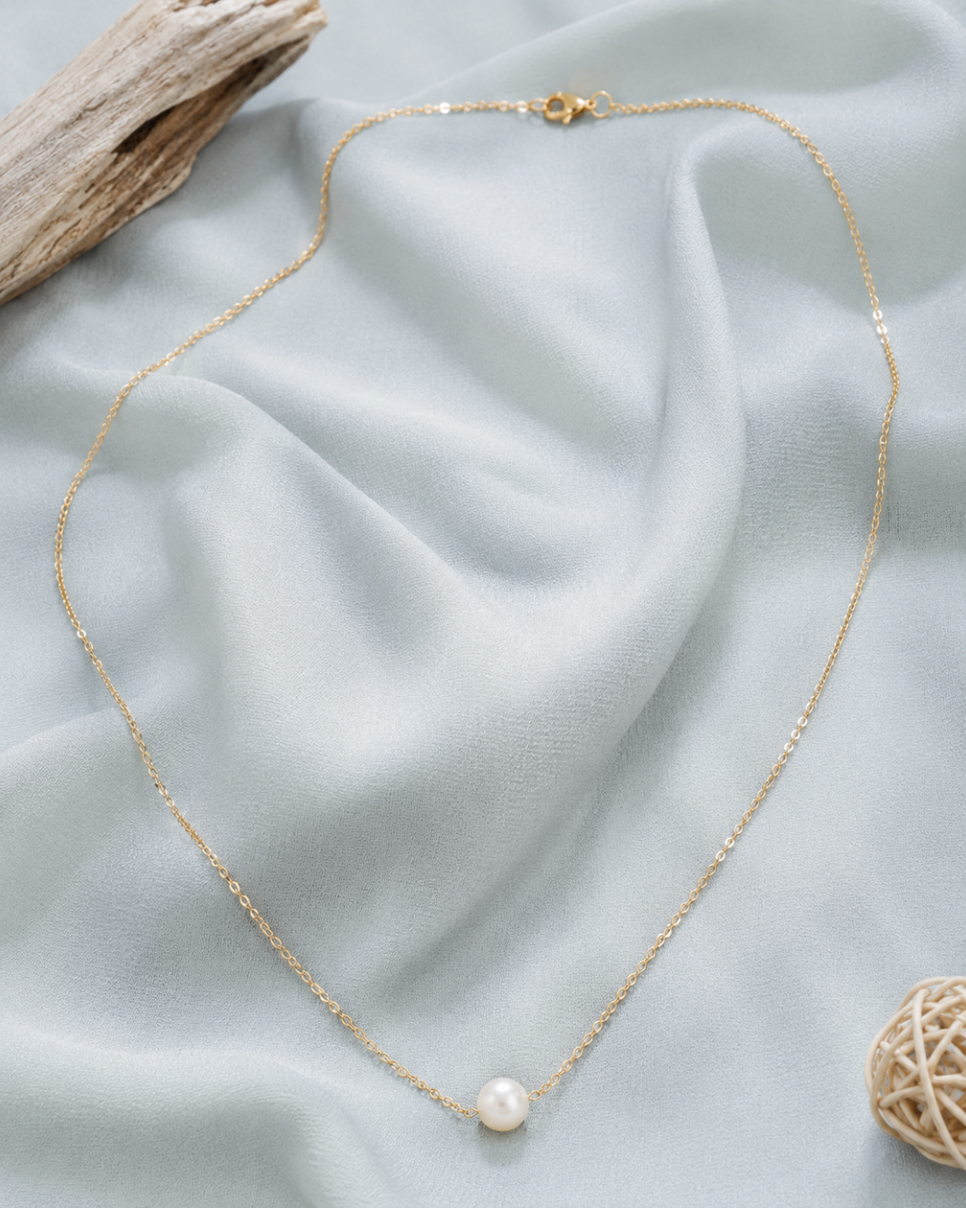 Elegant pearl solitaire necklace