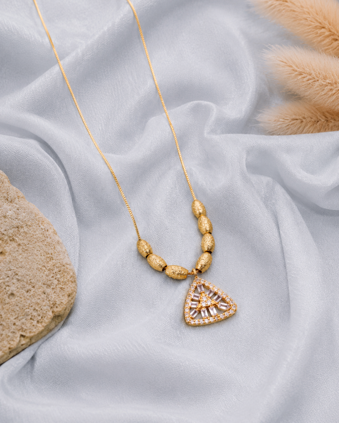 Golden prism geometric crystal necklace