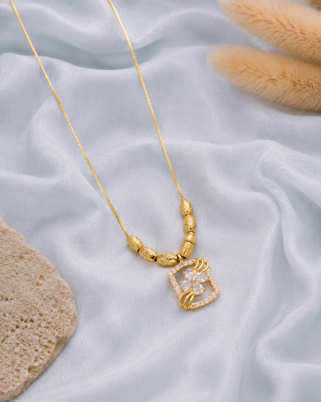 Golden floral crystal pendant necklace