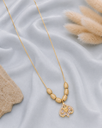 Golden floral crystal charm necklace