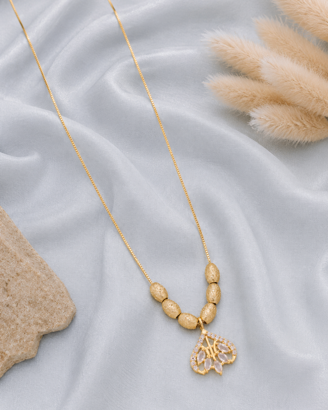 Golden floral crystal charm necklace