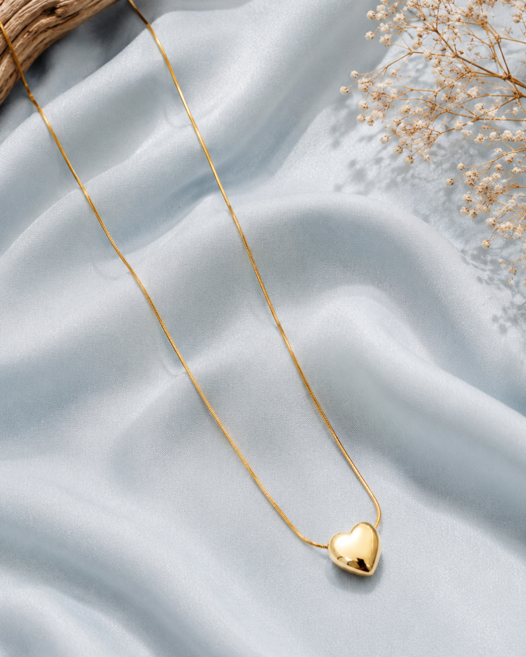 Golden puffy heart pendant necklace
