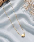 Golden puffy heart pendant necklace