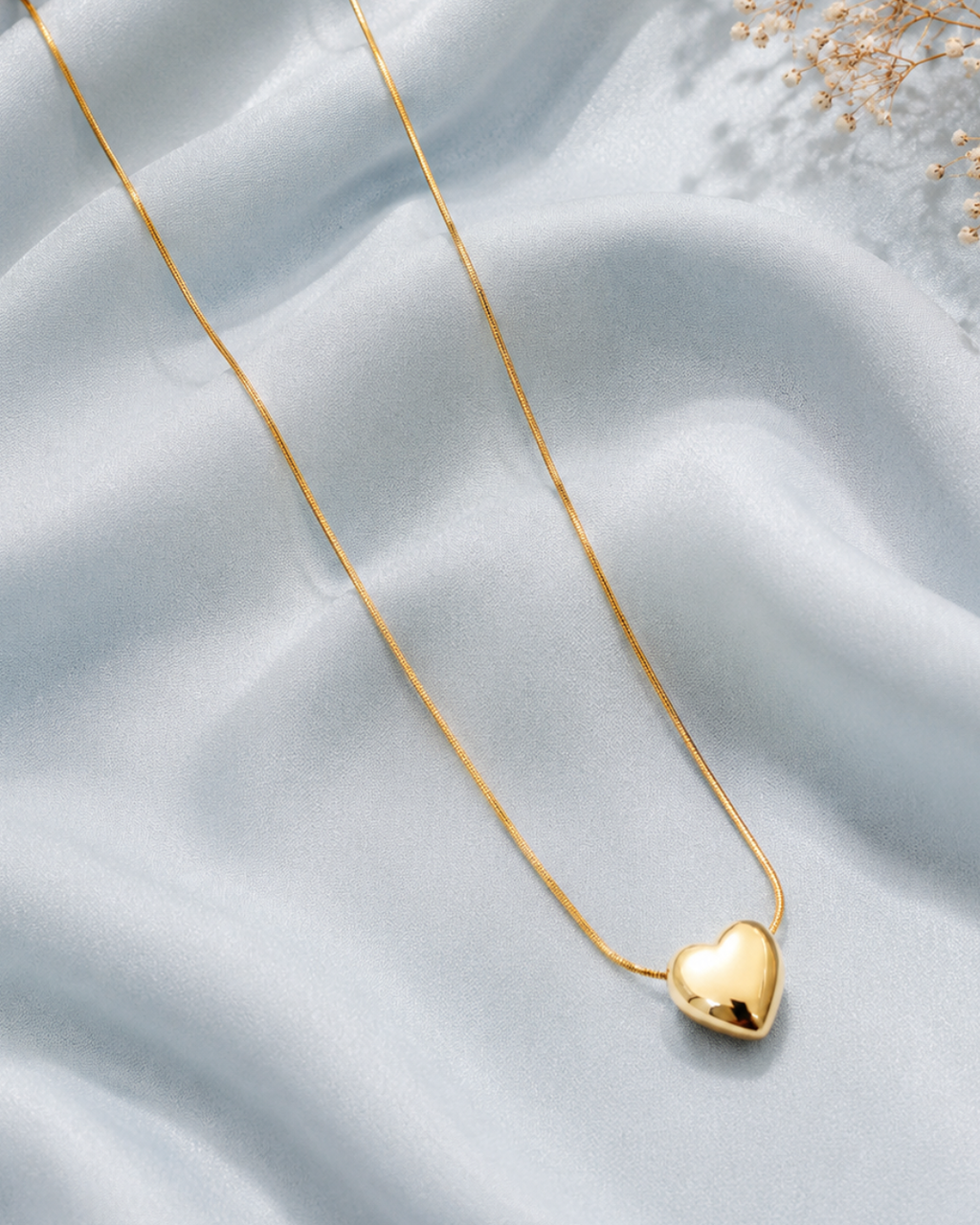 Golden puffy heart pendant necklace